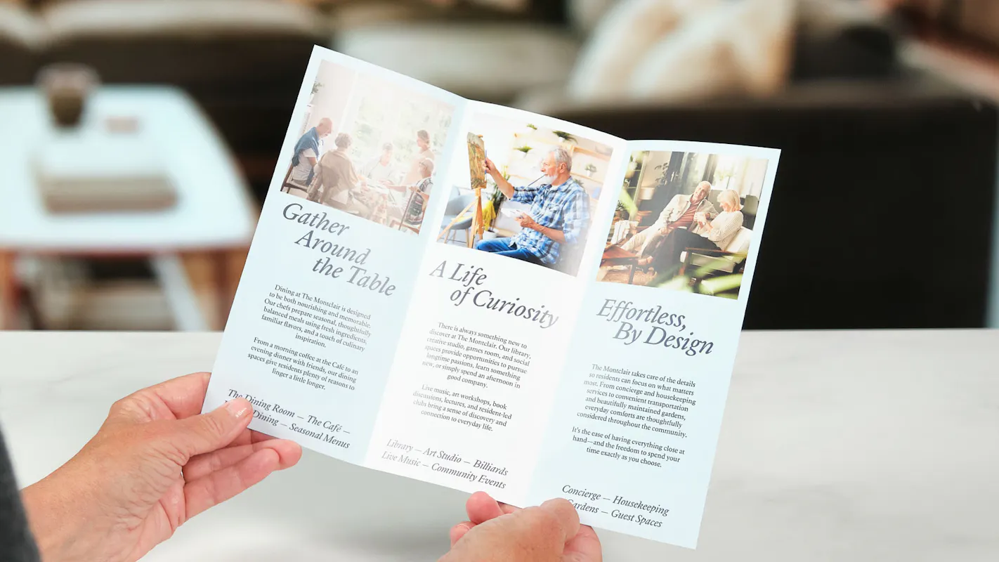 A collection of health care printing products, including a floor graphic, posters and business cards.